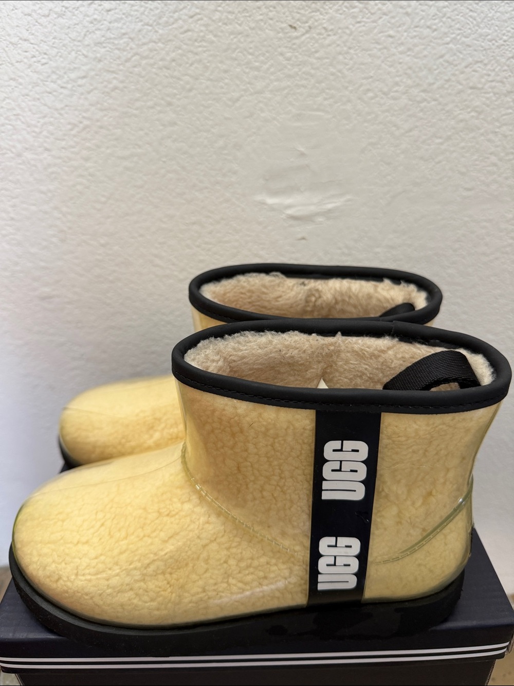 UGG Classic Clear Mini Waterproof Boots in the Natural / Black colorway. Size 6